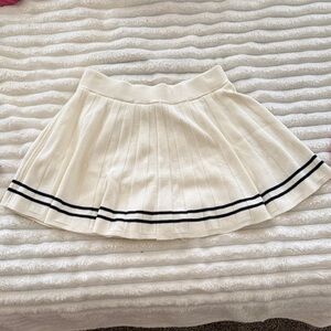 Sincerely Jules White Pleated Skort with Black Stripes, knit material